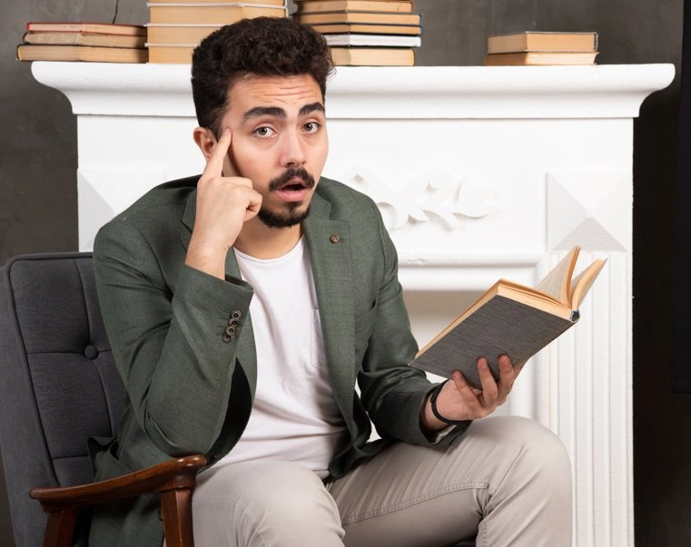 Author reviewing a book draft